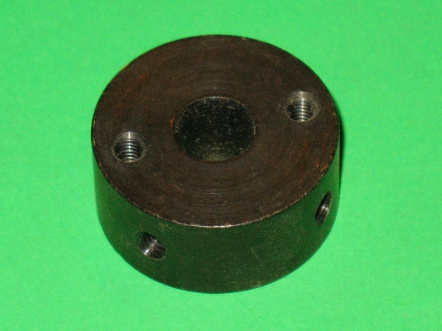 An image of an Adjuster on a green surface.