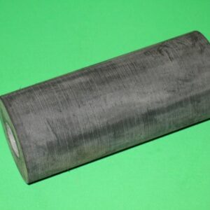 A roll of Cushion A on a green surface.