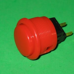 A 509-5323-01 Pushbutton, Red on a green background.