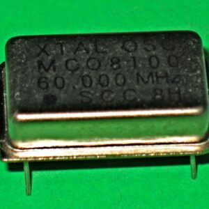 A 230-5053 53.693 MHz crystal on a green background.