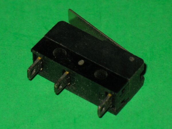 A small black 509-5226 on a green surface.