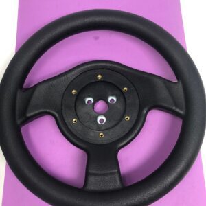 A black Crusin Exotica steering wheel on a purple background.