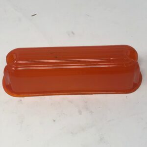 An orange plastic Win Lens container on a white surface.