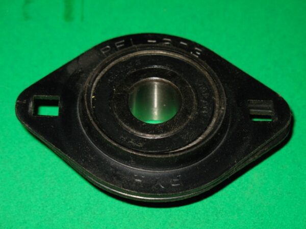A black bearing 15 on a green background.