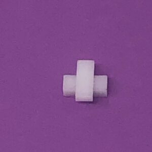 A Universal Joint on a purple surface.