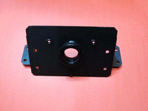 A black metal Brake Base plate with holes on it.