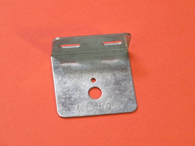 A VR bracket on a red surface.