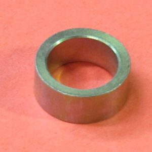 A Collar Actuate Shaft on a red surface.
