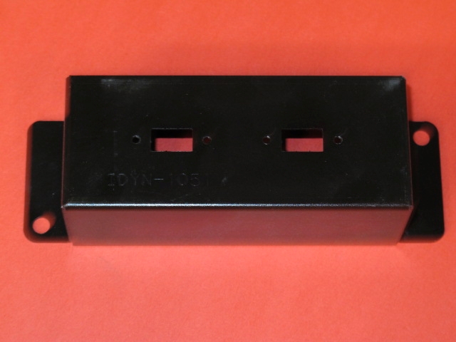 A black Bracket with two holes on it.