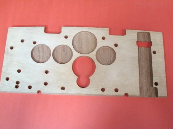 A wooden board with holes on it can be called a Base or Control Panel.