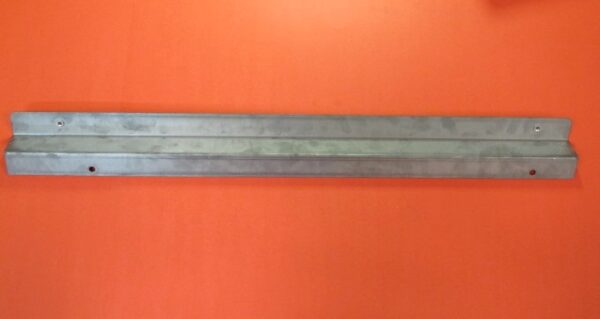 A Bracket Panel, Left hanging on an orange wall.