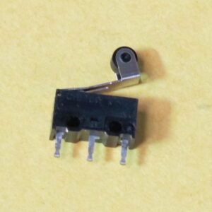 A Micro Switch on a yellow background.