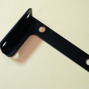 A black metal Bracket, joint Right on a table.