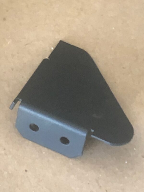 A black bracket on a table.