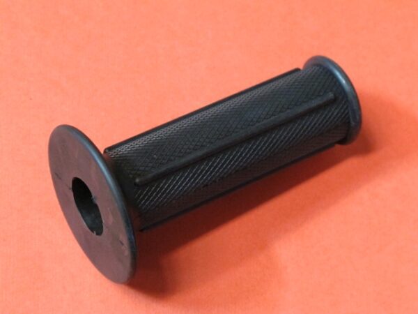 An Accel Grip, Right on a red surface.