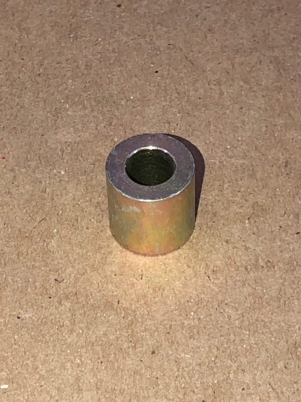 A small metal collar on a table.