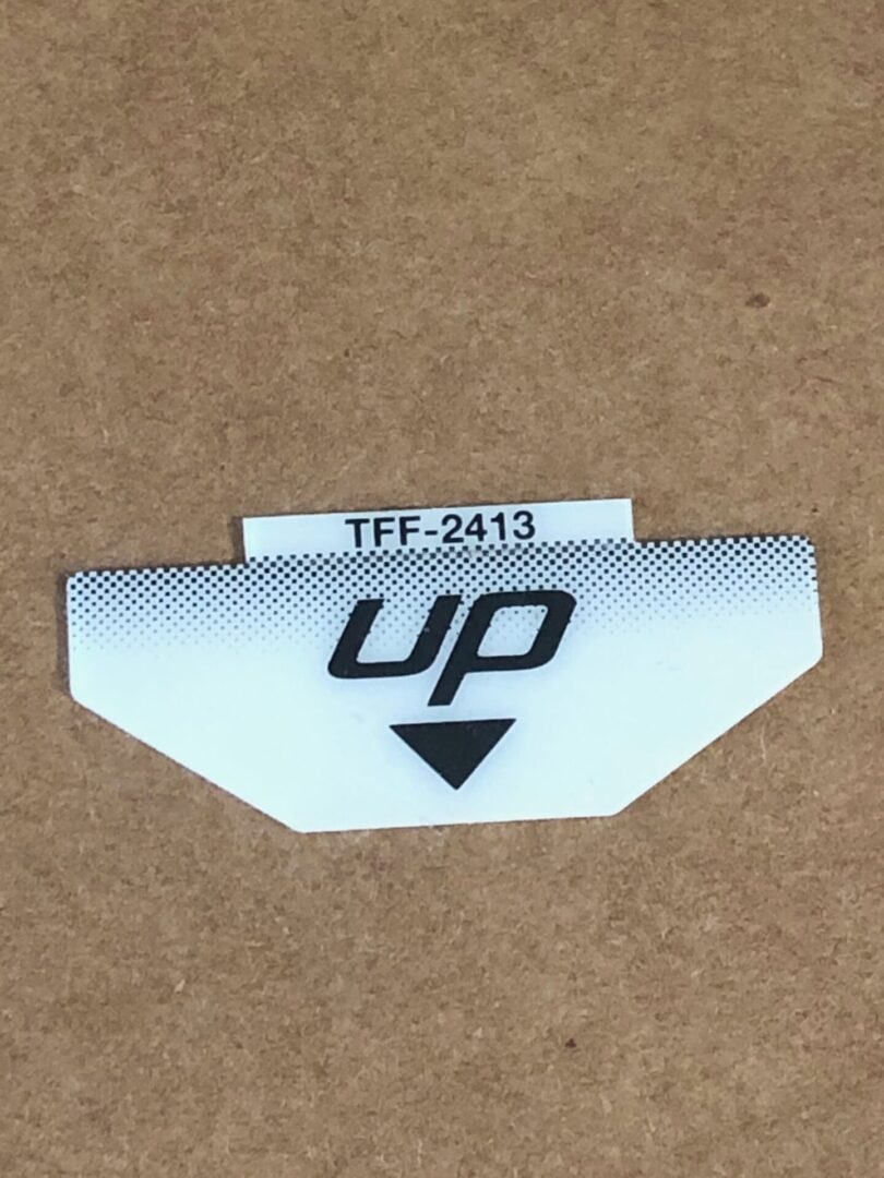 A white Up Decal with the word up on it.