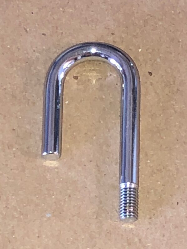 A stainless steel chain holder on a table.