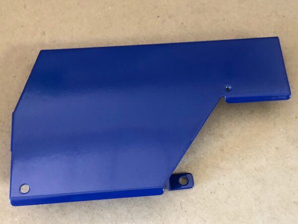 A blue Control Cover Lid RIGHT on a table.