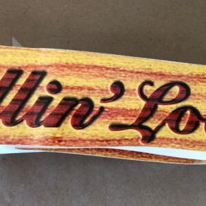 A decal with the word "Fallin Love" on it.