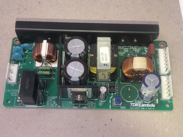 A VS150E-24 Power Supply with various components on it.