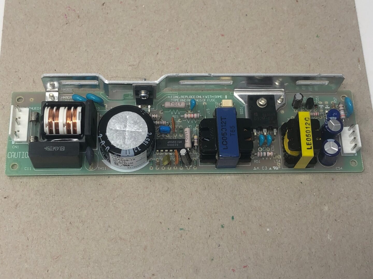 A circuit board with the LCA50S-12-Y power supply on it.