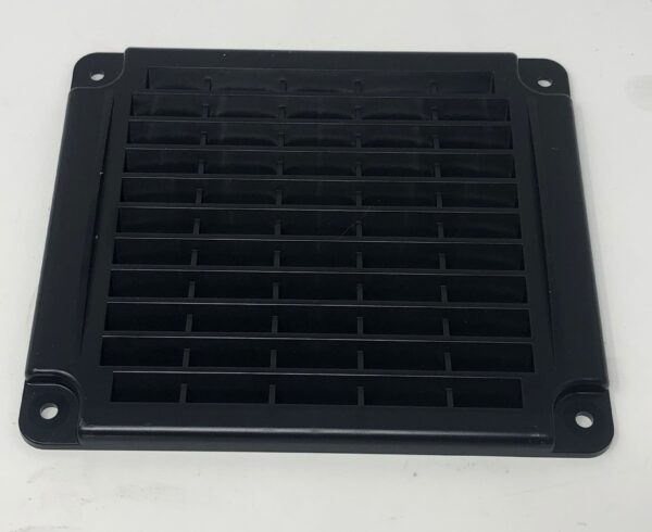 A black Air Vent Cover on a white surface.