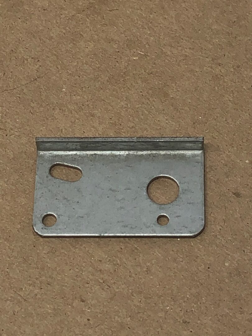 A Vol Bracket B with holes on it.