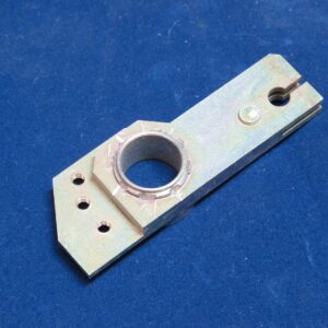 A VR Lever bracket with holes on a blue surface.