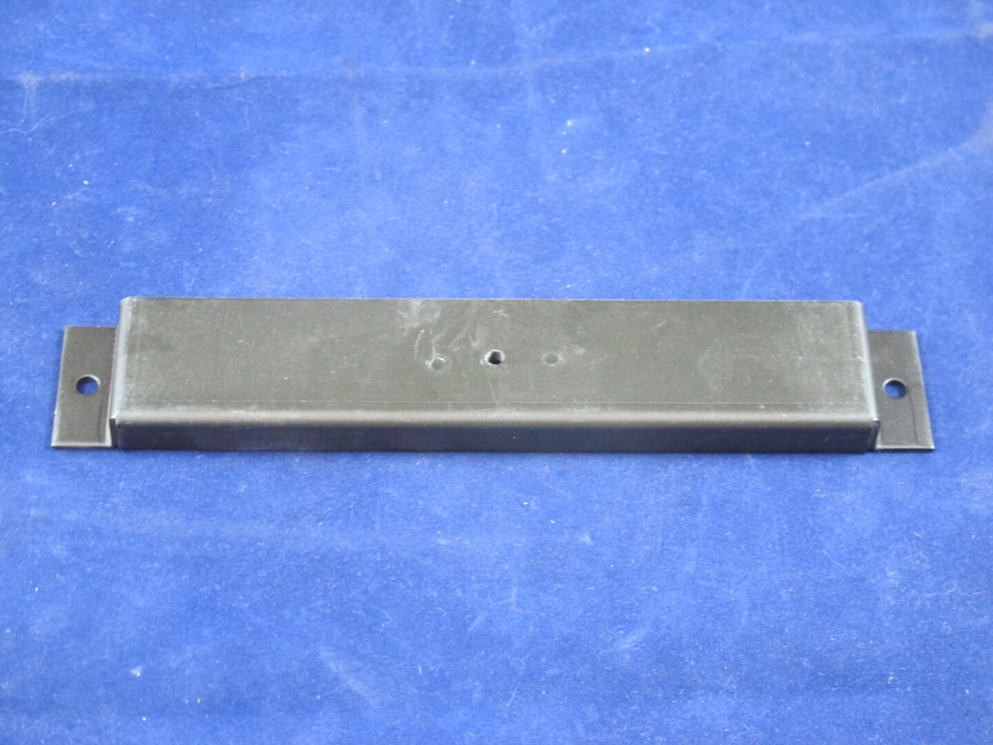 A Cover Bracket on a blue background.