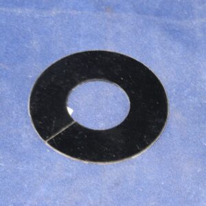 An Arm Cover B on a blue surface.