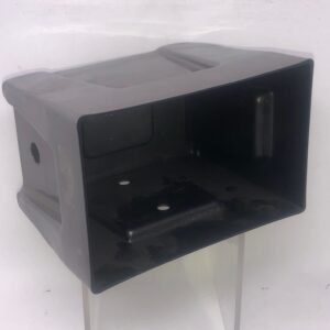 A Speaker Housing, Right Side sitting on top of a stand.