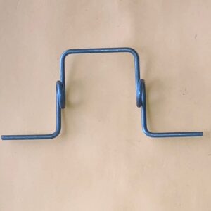 A pair of Wire Gate handles on a beige background.