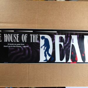 A cardboard box with a Deluxe Cabinet that says the house of the dead.