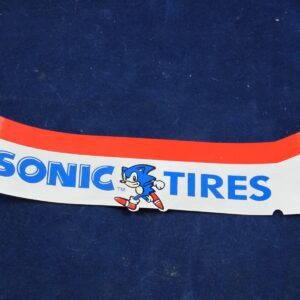 A Virtua Racing Marquee Decal SONIC TIRES on a blue surface.
