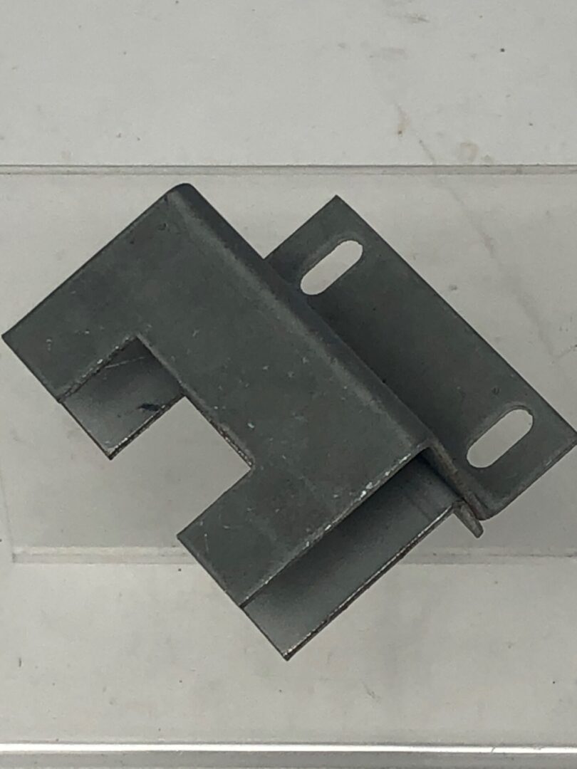 A Bracket with a hole in it.