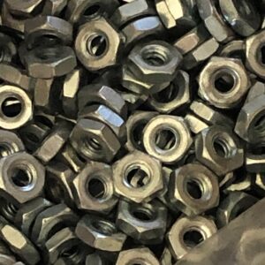 A pile of 10 - 24 Hex Nuts in a plastic bag.