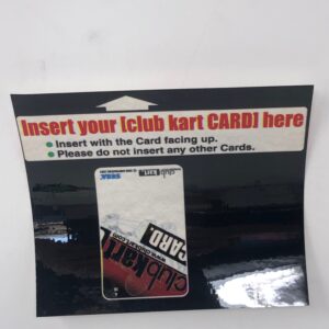 A plastic card with a sticker on it that says insert Club Kart here.