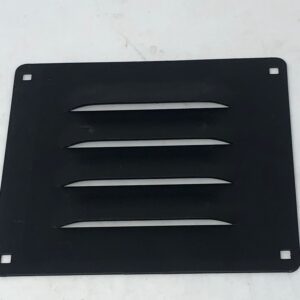 An Air Vent Cover with four holes on it.