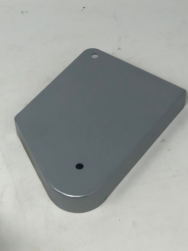 A gray metal Bracket on a white surface.