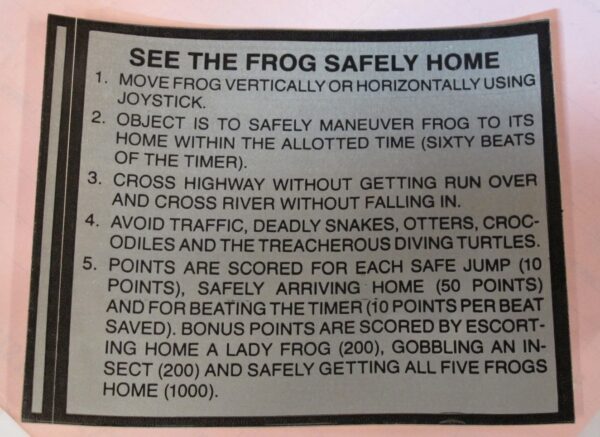 See the NOS Frogger UPRIGHT play instructions safety home sticker.
