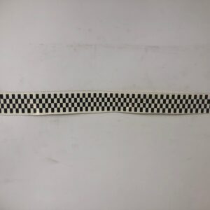 A black and white checkered pattern on a white surface decal.