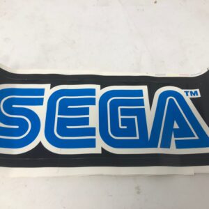 A Sega Logo Decal on a white surface.
