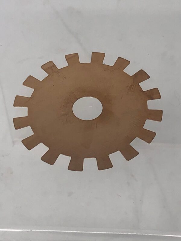 An image of a Coupler Disc, Hot Rod on a table.
