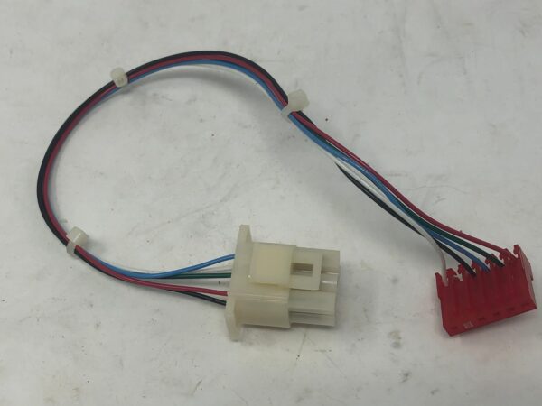 A red and white Video Interconnect wiring harness for a car.