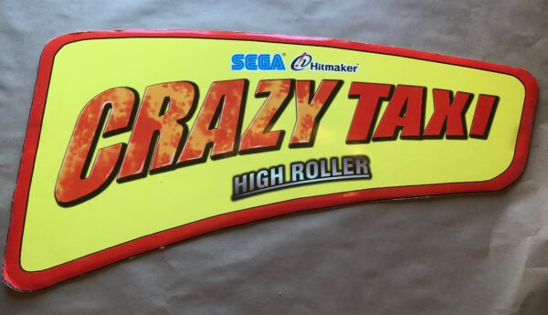 A sign that says Crazy Taxi High Roller POP Foam Board display.