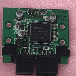 A small NOS Sega LM Converter Board on a pink background.